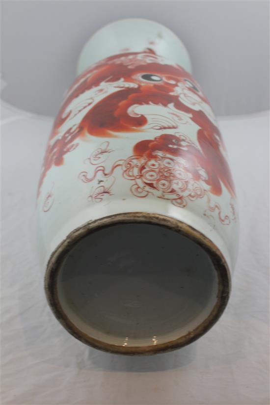 A Chinese iron red painted lion-dog baluster vase, late 19th / early 20th century, 59.5cm